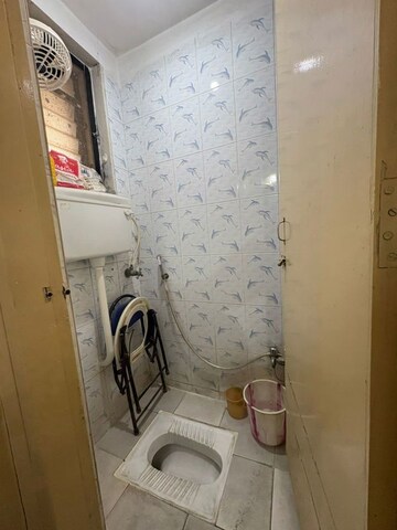 Bathroom in 1 BHK Apartment at Rajnigandha CHS Vasant Vihar, Vasant Vihar – for Sale