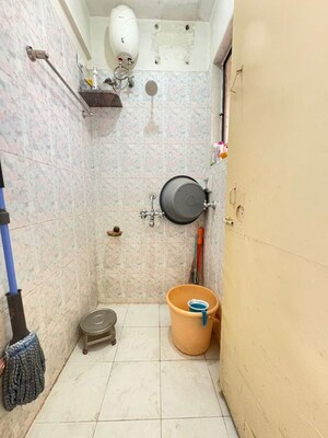 Bathroom in 1 BHK Apartment at Rajnigandha CHS Vasant Vihar, Vasant Vihar – for Sale