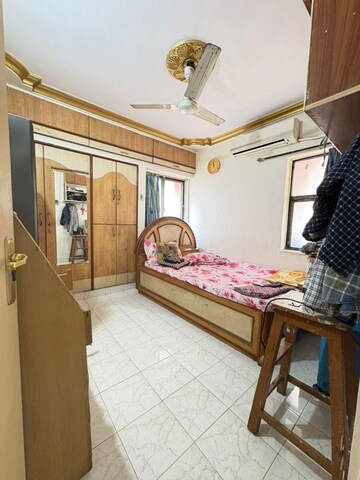 Bedroom in 1 BHK Apartment at Rajnigandha CHS Vasant Vihar, Vasant Vihar – for Sale