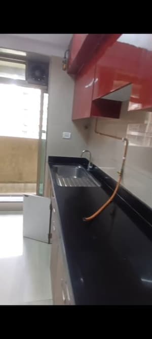 Kitchen in 2 BHK Apartment at Sheth Vasant Oasis, Andheri East – for Rent