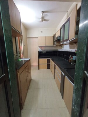 Kitchen in 2 BHK Apartment at Thakur Gayatri Satsang, Kandivali East – for Sale