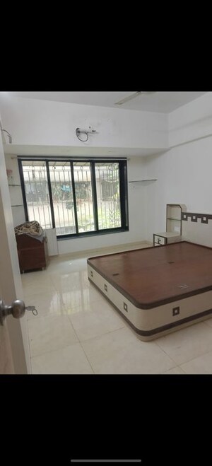 Living Room in 1 BHK Apartment at Evershine CHS Malad, Malad West – for Rent