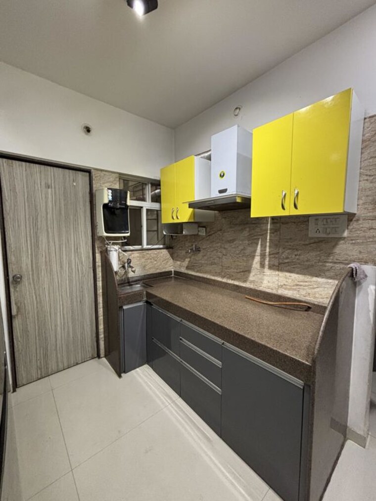 Kitchen, sukhwani-palms 2 Bedroom 1020 Sq.Ft. Apartment In Wagholi Pune 10129582