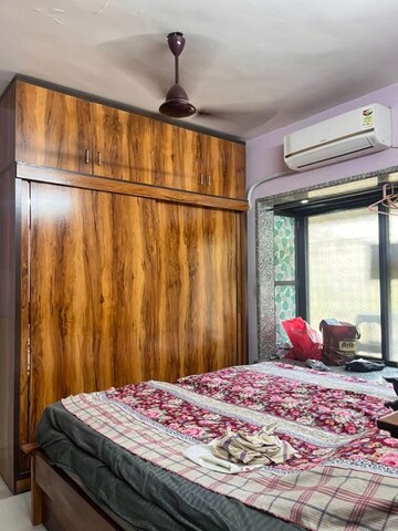 Bedroom in 1 BHK Apartment at Brahmand CHS, Brahmand – for Sale