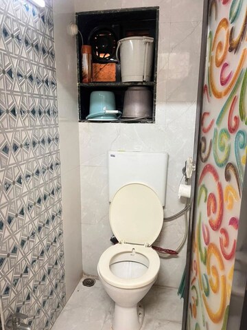 Bathroom in 1 BHK Apartment at Brahmand CHS, Brahmand – for Sale