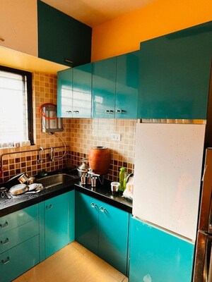 Kitchen in 2 BHK Apartment at Pimple Gurav – for Rent