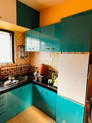 Kitchen in 2 BHK Apartment at Pimple Gurav – for Rent