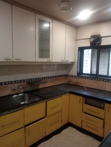 Kitchen in 3 BHK Apartment at Meena Towers Apartment, Chembur – for Rent