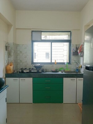 Kitchen in 2 BHK Apartment at Nav Jagruti CHS Goregaon, Goregaon West – for Sale