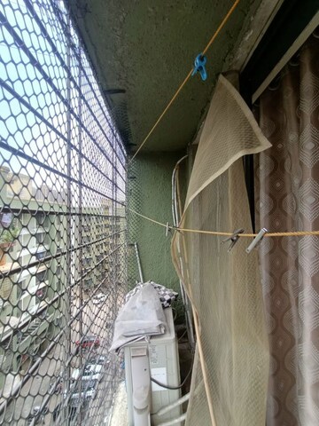 Balcony in 2 BHK Apartment at Nav Jagruti CHS Goregaon, Goregaon West – for Sale