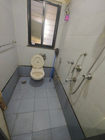 Bathroom in 2 BHK Apartment at NRI Complex Phase I, Seawoods Sector 58 – for Rent