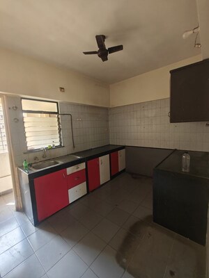 Kitchen in 2 BHK Apartment at NRI Complex Phase I, Seawoods Sector 58 – for Rent