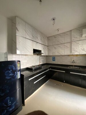 Kitchen in 2 BHK Apartment at Shri Radha Sky Gardens, Sector 16b Greater Noida – for Rent