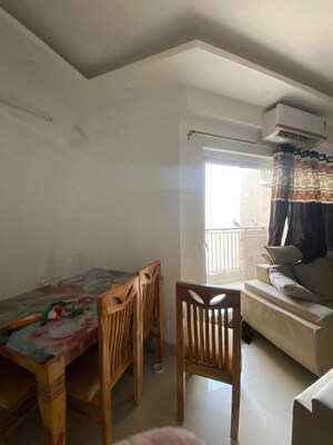 Living Room in 2 BHK Apartment at Shri Radha Sky Gardens, Sector 16b Greater Noida – for Rent