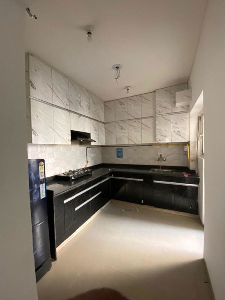 Kitchen, shri-radha-sky-gardens 2 Bedroom 1286 Sq.Ft. Apartment In Sector 16b Greater Noida Greater Noida 10129855