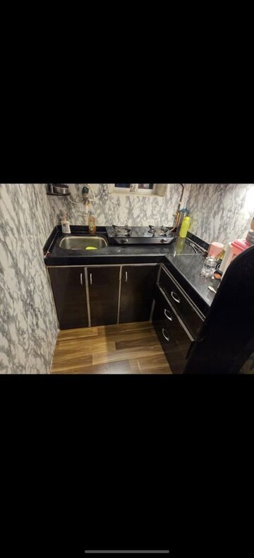 Kitchen in 1 BHK Apartment at Unity Apartment Malad, Malad West – for Rent