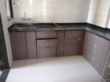 Kitchen in 2 BHK Apartment at Ravinanda Skylights, Wagholi – for Sale