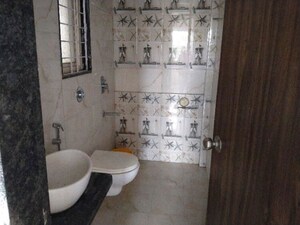 Bathroom in 2 BHK Apartment at Ravinanda Skylights, Wagholi – for Sale