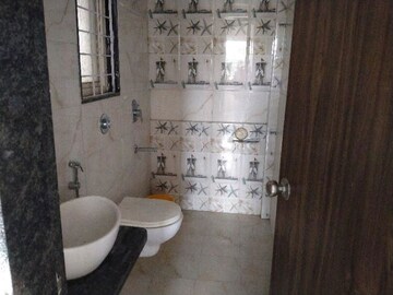 Bathroom in 2 BHK Apartment at Ravinanda Skylights, Wagholi – for Sale