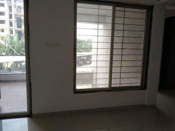 Room in 2 BHK Apartment at Ravinanda Skylights, Wagholi – for Sale