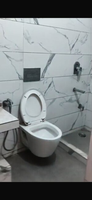 Bathroom in 2.5 BHK Apartment at Rohini Sector 14 – for Sale