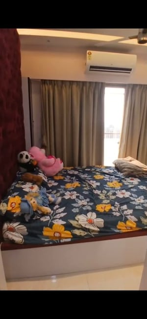Bedroom in 2 BHK Apartment at Milap CHS, Andheri West – for Rent