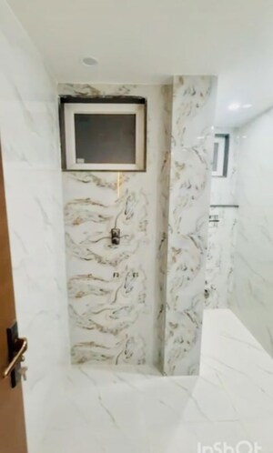 Bathroom in 3 BHK Apartment at Rohini Sector 13 – for Sale