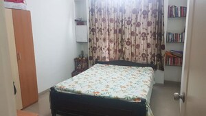 Bedroom in 2 BHK Apartment at Gulmohar Queenstown, Kharadi – for Rent