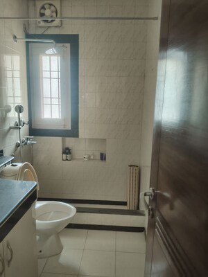 Bathroom in 4 BHK Apartment at Sarita Vihar – for Rent