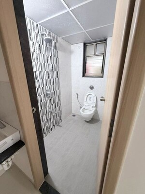 Bathroom in 2 BHK Apartment at Kohinoor Courtyard One, Wakad – for Rent