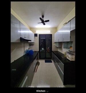 Kitchen in 2 BHK Apartment at Tharwani Rosewood Heights, Kharghar Sector 10 – for Sale