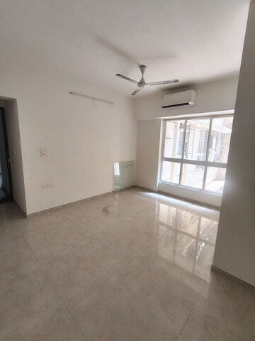 Living Room in 1 BHK Apartment at Lodha Amara, Kolshet Road – for Rent