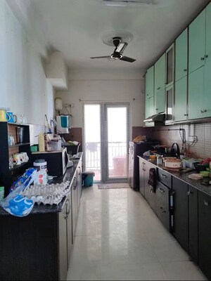 Kitchen in 3.5 BHK Apartment at Antriksh Golf View, Sector 78 – for Rent