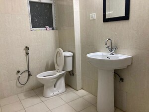 Bathroom in 3.5 BHK Apartment at Antriksh Golf View, Sector 78 – for Rent
