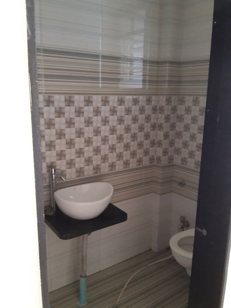 Bathroom, wakad 2 Bedroom 680 Sq.Ft. Apartment In Wakad Pune 10130227