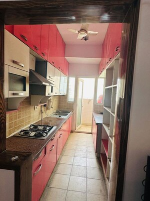 Kitchen in 3 BHK Apartment at Mahagun Moderne, Sector 78 – for Rent