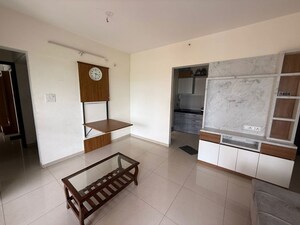 Living Room in 2 BHK Apartment at Shapoorji Pallonji Joyville Hinjewadi, Hinjewadi – for Rent