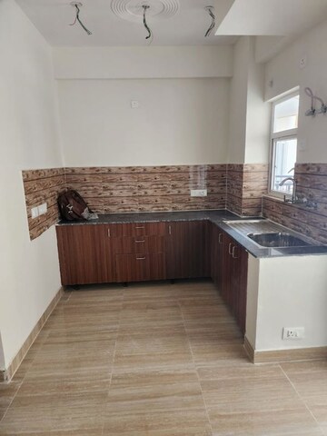 Kitchen in 2.5 BHK Apartment at Amrapali Terrace Homes, Tech Zone 4 Greater Noida – for Sale