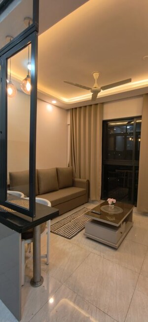 Living Room in 1 BHK Apartment at Lodha Crown Quality Homes, Majiwada – for Rent