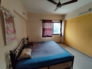Bedroom in 2 BHK Apartment at DNV Elite Homes, Tathawade – for Rent