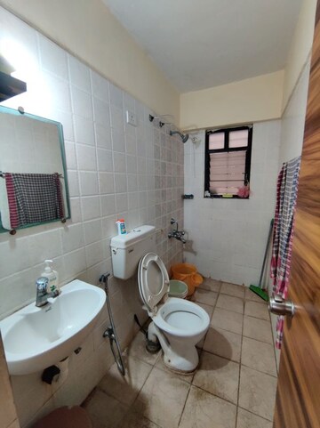 Bathroom in 2 BHK Apartment at DNV Elite Homes, Tathawade – for Rent