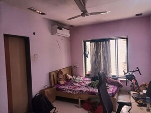 Bedroom in 2 BHK Apartment at Suvarnayug Society, Aundh – for Rent