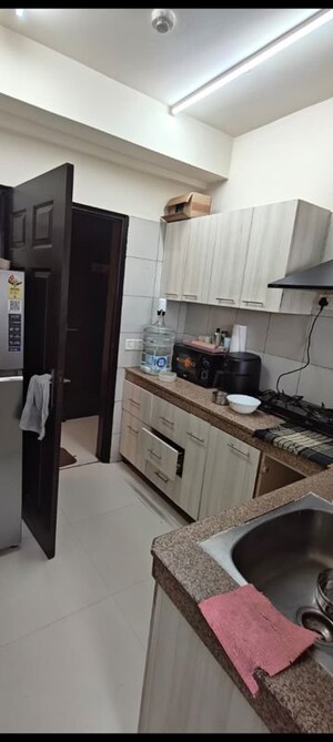 Kitchen in 3 BHK Apartment at Amarpali Exotica, Sector 50 – for Sale