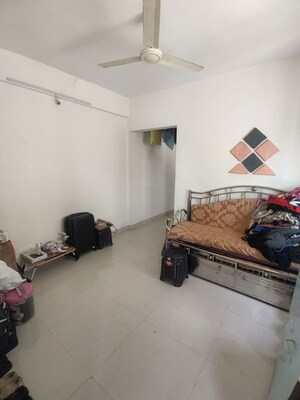 Living Room in 1 BHK Apartment at Vanaz Corner, Kothrud – for Rent