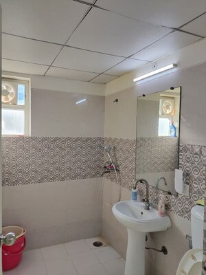 Bathroom in 2.5 BHK Apartment at Gaur City 2 - 12th Avenue, Sector 16c Greater Noida – for Sale