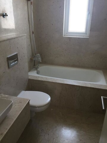 Bathroom in 4 BHK Apartment at Emaar Palm Terraces Select, Sector 66 – for Sale