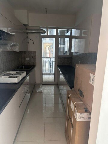 Kitchen in 2 BHK Apartment at Godrej Woods, Sector 43 – for Rent
