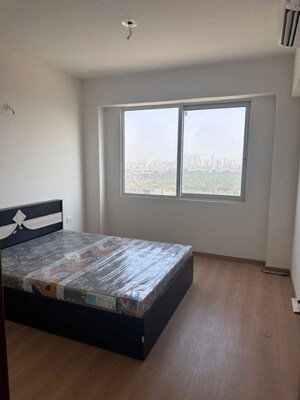 Bedroom in 2 BHK Apartment at Godrej Woods, Sector 43 – for Rent