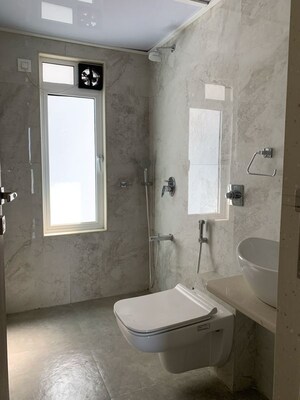 Bathroom in 3 BHK Apartment at Shraddha Elite, Poisar – for Rent