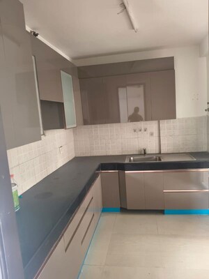 Kitchen in 3 BHK Apartment at Ramprastha City The Edge Towers, Sector 37d – for Rent